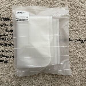 Monos Check-in Luggage Cover M